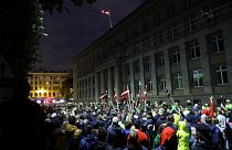 Protesters gather at the government building during a rally against mandatory vaccinations in Riga.