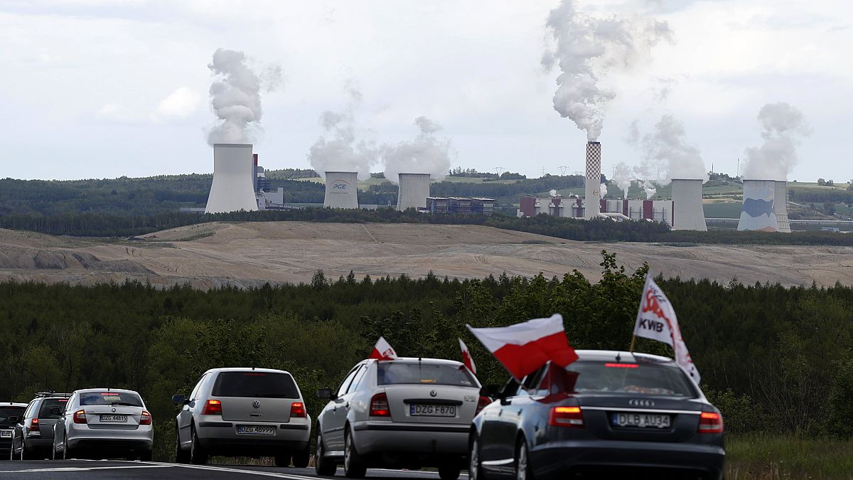 Cars block the border between the Czech Republic and Poland near the Turow coal mine.