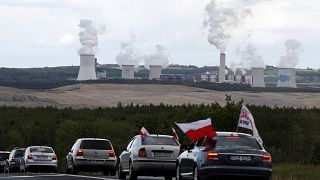 Cars block the border between the Czech Republic and Poland near the Turow coal mine.