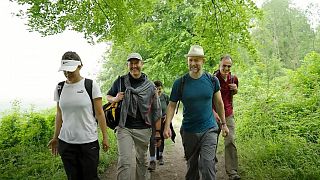 Sam Baker'ın rehberlik ettiği grup 26 gün boyunca 820 kilometre yol yürüdü ve COP26 Zirvesi'nin ilk gününe yetişti.
