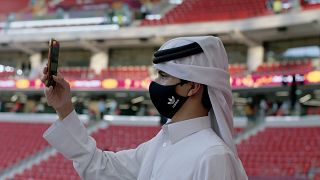 A fan takes in the surroundings at the Al Thumama stadium ahead of the Amir Cup final