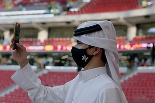 A fan takes in the surroundings at the Al Thumama stadium ahead of the Amir Cup final