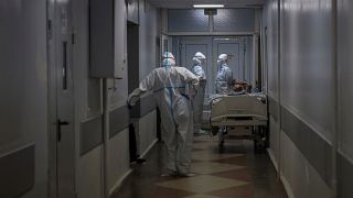 Medical workers in protective gear in a hospital in Krasnodar, southern Russia