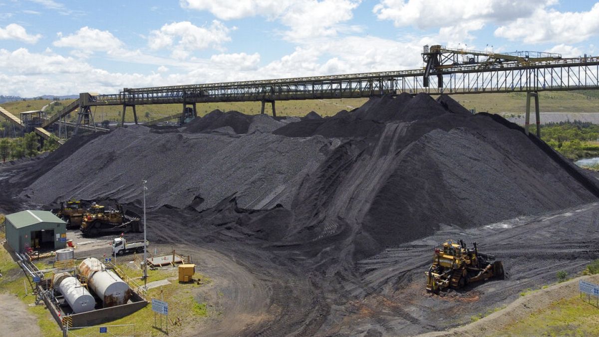 A stack of coal waits to be transported from a site near Muswellbrook in the Hunter Valley, Australia
