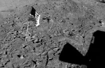 July 21, 1969 photo shows a U.S. flag planted at Tranquility Base on the surface of the moon