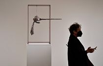 A person walks past Alberto Giacometti's "Le Nez", part of The Macklowe Collection, at Sotheby's on November 5, 2021 in New York City.