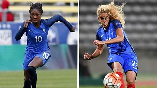 Midfielders Aminata Diallo (L) and Kheira Hamraoui (R) in action for France.