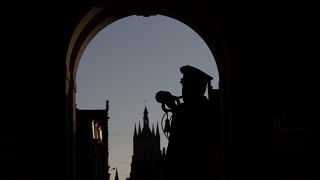 A lone bugler plays the nightly Last Post under the World War I monument, Menin Gate, in Ypres, Belgium, Saturday, April 25, 2020.