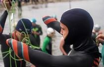 چالش شناگر فرانسوی با وجود قطع چهار عضو در مرتفع‌ترین دریاچه جهان