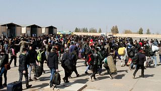 مهاجران افغان در گذرگاه اسلام قلعه در مرز ایران