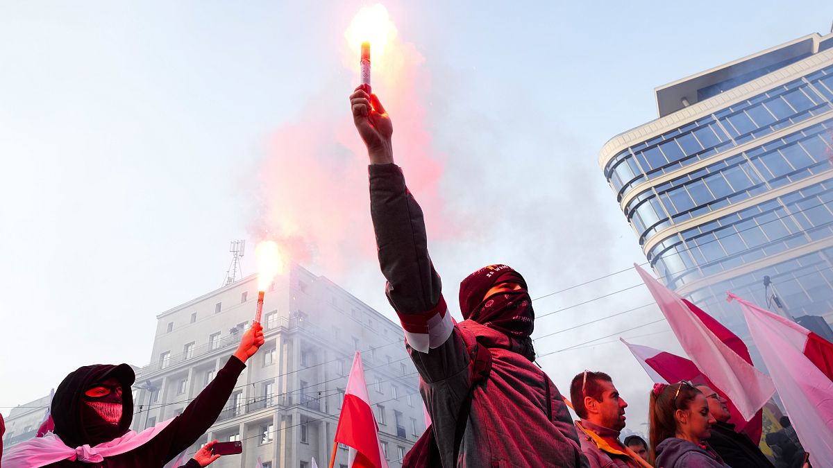 Protesters attend in the annual Independence Day march in Warsaw
