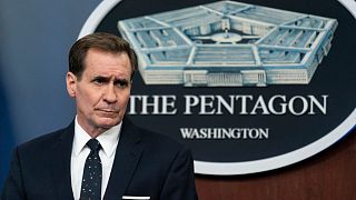Pentagon spokesman John Kirby pauses while speaking during a media briefing.