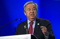 António Guterres usou na lapela um pin que apela ao compromisso pela meta de um aumento máximo de 1,5ºC até 2030