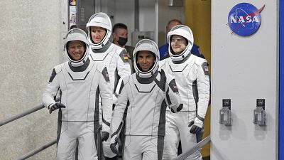 Astronauts, from left, Tom Marshburn, Matthias Maurer, of Germany, Raja Chari and Kayla Barron wave as they leave  for a trip to Launch Pad 39-A Wednesday, November 10, 2021.