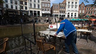 A restaurant opens up in Utrecht on April 28, 2021, as lockdown restrictions were eased. Such moves could now go into reverse due to rising coronavirus cases.