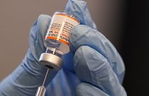 Paramedic Rebecca Hoke prepares a dose of the Pfizer-BioNTech COVID-19 vaccine in Fort Worth, Texas, Nov. 11, 2021.