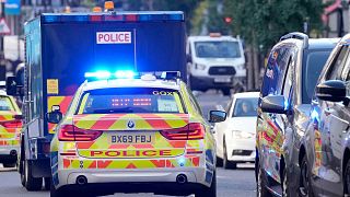 سيارة شرطة تغادر محكمة وستمنستر الابتدائية في لندن، الخميس 21 أكتوبر 2021
