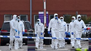 Police forensics officers start to depart after working outside the Women's Hospital in Liverpool on November 15, 2021, the scene of Sunday's taxi explosion.