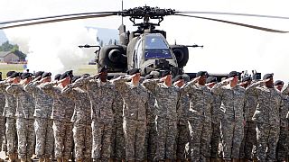 Soldiers of 1AD attend a color casing ceremony of the First Armored Division at the US Army Airfield in Wiesbaden, Germany. 2011