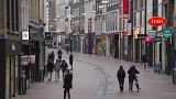 All non-essential stores remain closed and only a few people are seen in the center of Nijmegen, Netherlands, Friday, Jan. 14, 2022