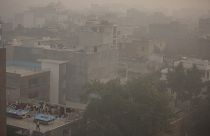 Morning haze and smog envelops the skyline in New Delhi, India, Friday, Nov. 5, 2021.