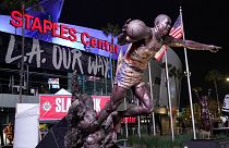 The statue of former Los Angeles Lakers Magic Johnson is seen in front of Staples Center.
