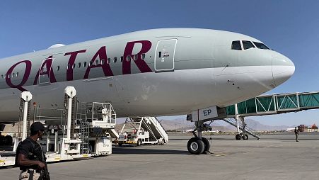 A Qatar airways flight heading to Doha on the tarmac at the airport in Kabul on October 20, 2021.