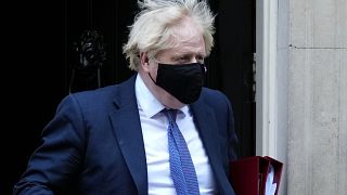 Britain's Prime Minister Boris Johnson leaves 10 Downing Street to attend the weekly sesion of Prime Ministers Questions at Parliament in London, Wednesday, Nov. 17, 2021.