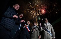 Mayor of Beaujeu Sylvain Sotton (C) takes part in the traditional event "the Sarmentelles" announcing the beginning of the "Beaujolais Nouveau" 2021 wine edition on 17/11/2021