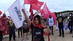 Activists denounce fast fashion in plastic catwalk protest in Tel Aviv