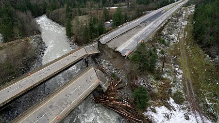 Damage caused by heavy rains and mudslides earlier in the week is pictured along the Coquihalla Highway near Hope, British Columbia