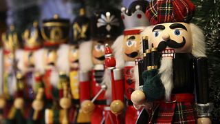 Christmas decoration is displayed at a stand prior to the opening of the traditional Christmas market at the Old Town in Nuremberg, Germany