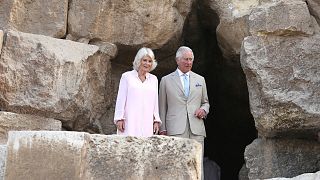 Britain's Prince Charles and his wife, Camilla visit the pyramids of Giza, on the edge of Cairo, Egypt, Thursday, Nov. 18, 2021.