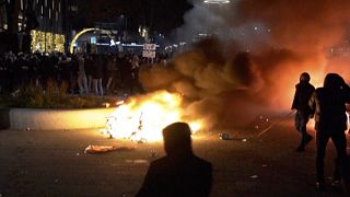 n this image taken from video, demonstrators protest against government restrictions due to the coronavirus pandemic, Friday, Nov. 19, 2021, in Rotterdam, Netherlands. 