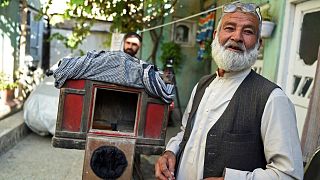 حاجی میرزمان، عکاس افغان با جعبه عکاسی