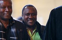 Claude Muhayimana (C), one of the two Rwandan men accused of taking part in the massacre of ethnic Tutsis during the Rwandan genocide in Paris, on November 13, 2013.