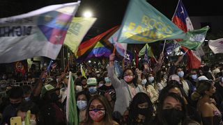 Supporters of presidential candidate Gabriel Boric gather at his headquarters after polls closed and partial results were announced in Santiago, Chile, on November 21, 2021. 