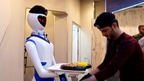 Empregados de mesa robôs em Mossul