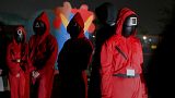 Wannabe Italian 'Squid Game' competitors are picked up by 'guards' at night