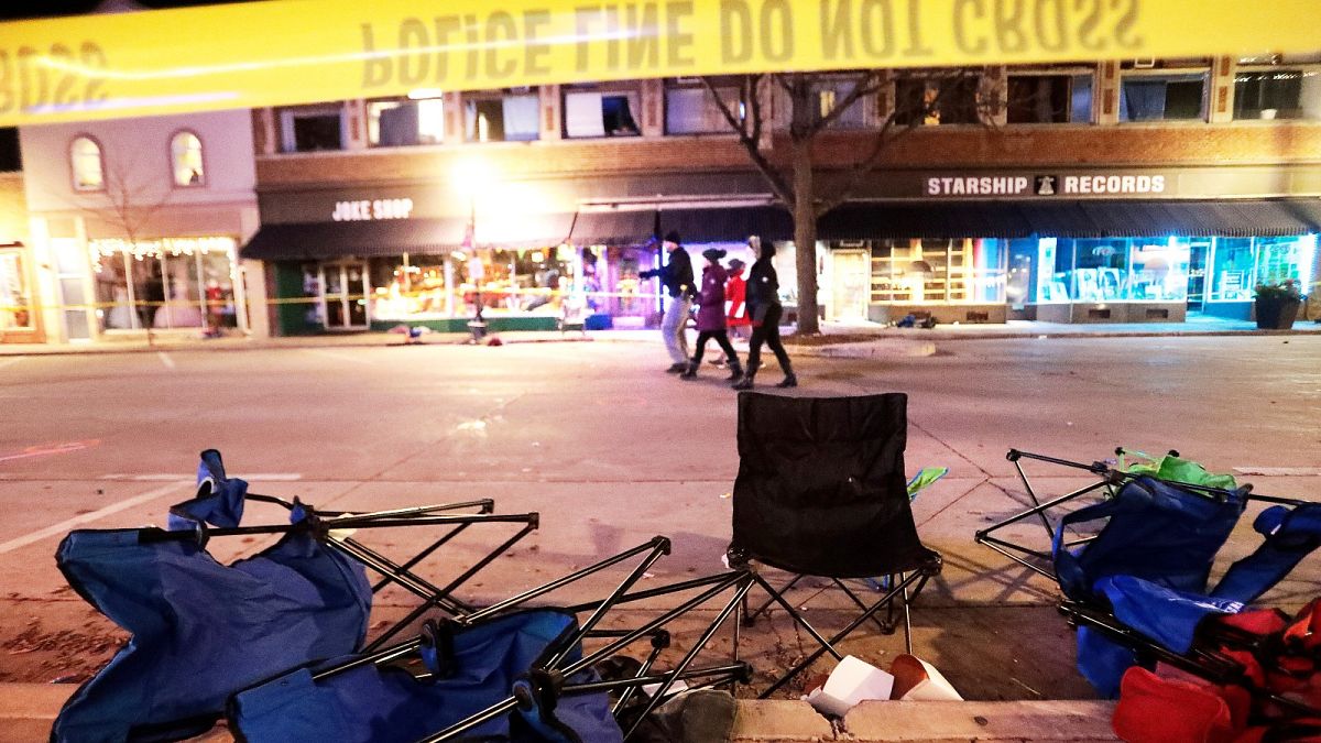 Toppled chairs line W. Main St. in downtown Waukesha, after an SUV drove into a parade of Christmas marchers Sunday, Nov. 21, 2021.