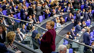 المستشارة الألمانية أنجيلا ميركل خلال الجلسة العامة الأولى للبرلمان الألماني البوندستاغ بعد الانتخابات، برلين، الثلاثاء 26 أكتوبر 2021