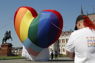 Activists display a large rainbow heart in front of Hungary's parliament building in Budapest in July.