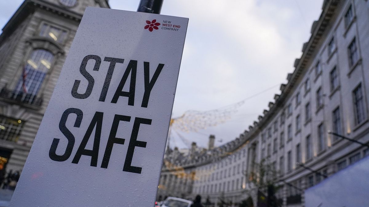 A sign reading 'Stay safe' in Regent Street, in London, Friday, Nov. 26, 2021.