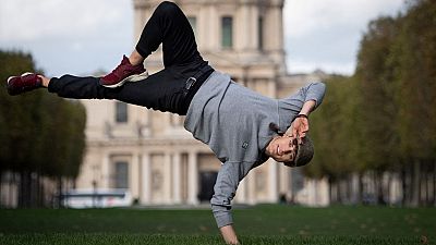 Polish opera singer and breakdancer Jakub Jozef Orlinski poses for pictures in front of the Invalides (Hotel des Invalides), on November 7, 2019 in Paris.