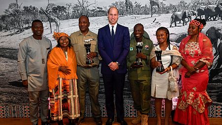 Britain's Prince William, Duke of Cambridge, poses for a photograph with Tusk Conservation Awards winners and finalists at reception
