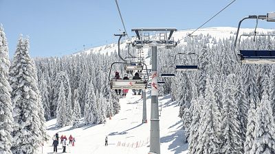 People travel in a ski lift