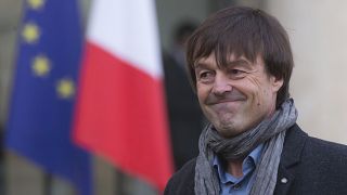  In this Thursday, Dec. 6 2012 file photo, environmental activist Nicolas Hulot, smiles as he leaves the Elysee Palace in Paris, France.
