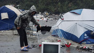 Нелегальный мигрант в лагере Гранд-Сент, ноябрь 2021 года