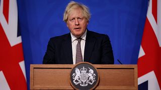 Britain's Prime Minister Boris Johnson speaks during a press conference in London, Nov. 27, 2021.