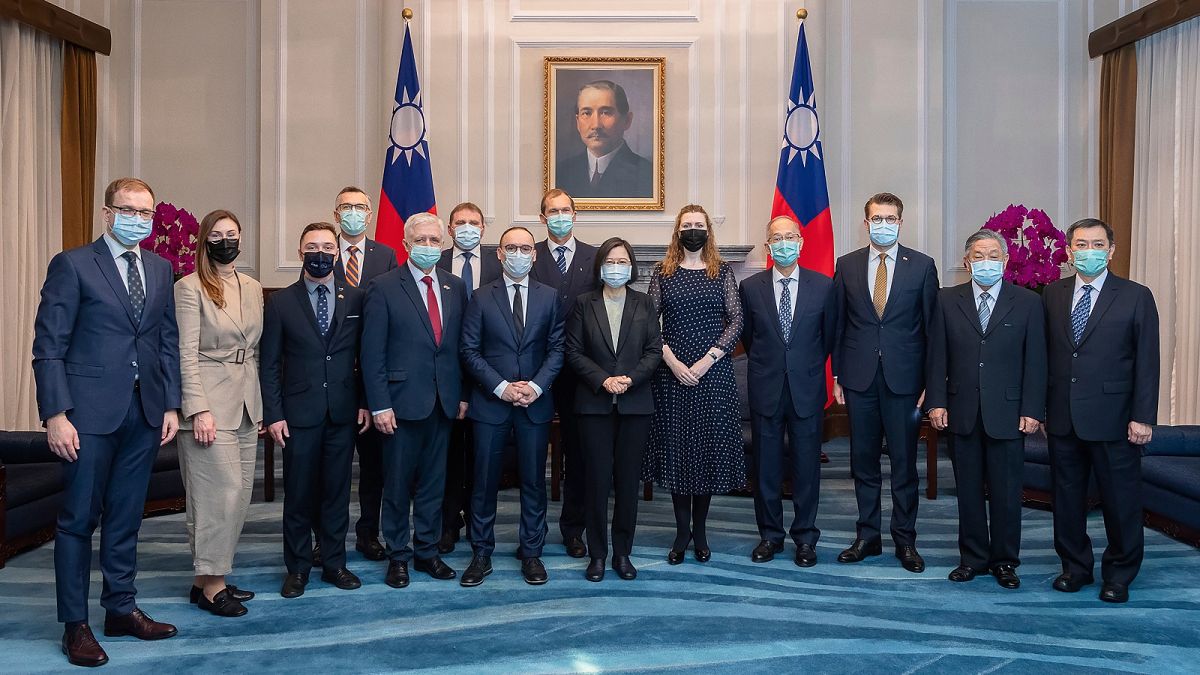 Taiwanese President Tsai Ing-wen, centre, poses for photos with a delegation from the Baltic States at the Presidential Office in Taipei, Taiwan on Monday, Nov. 29, 2021.
